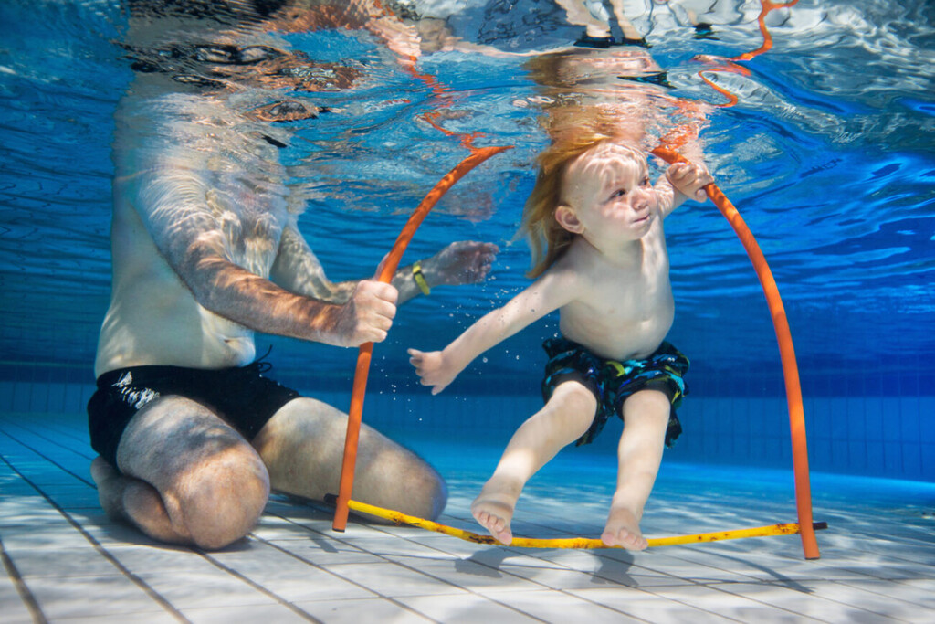 Child underwater without armbands